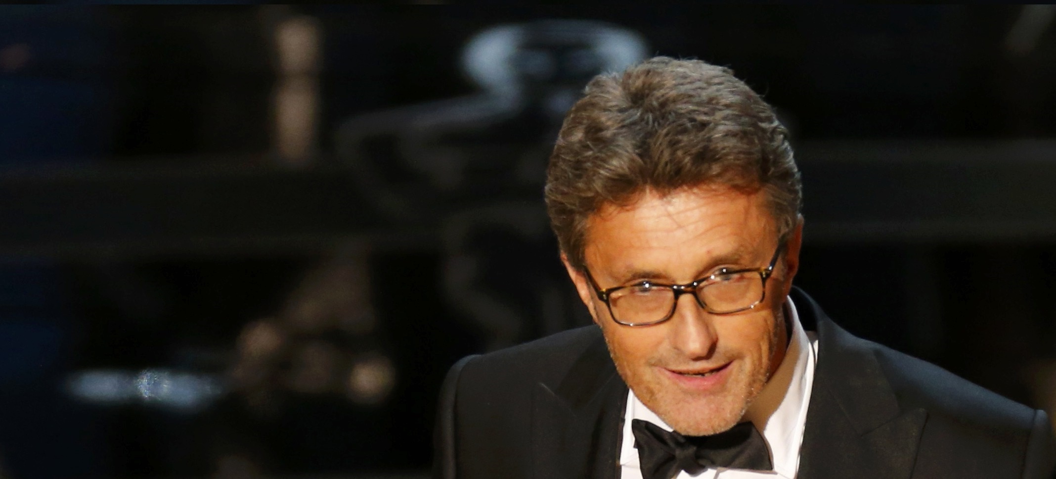 Director Pawel Pawlikowski holds his Oscar for best foreign language film at the 87th Academy Awards in Hollywood, California
