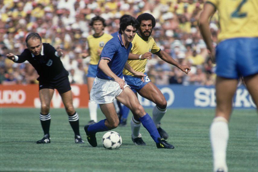 1982 World Cup Second Round Group C match in Barcelona, Spain. Italy 3 v Brazil 2. Italy's Paolo Rossi battles for the ball with Junior. 5th July 1982.