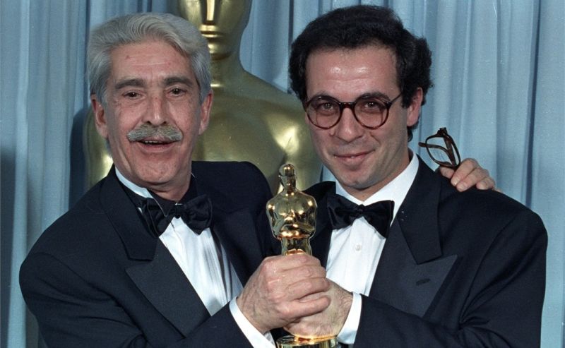 Franco Cristaldi e Giuseppe Tornatore con l'Oscar nel 1990