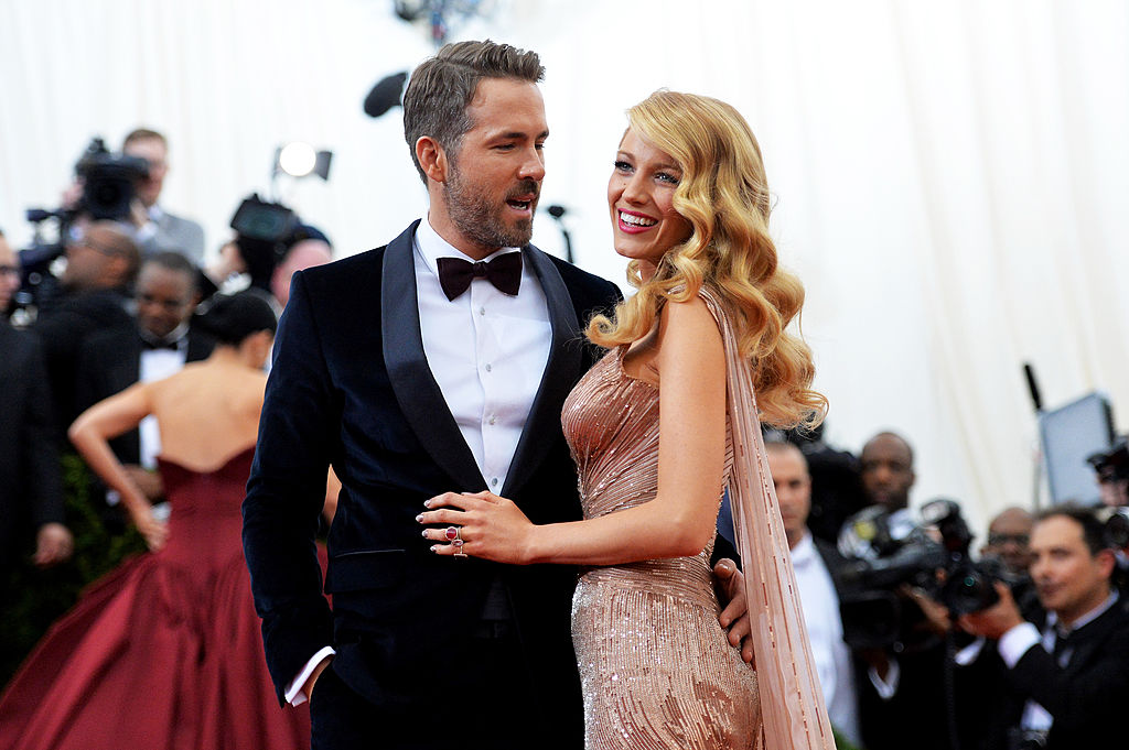 NEW YORK, NY - MAY 05: Actors Ryan Reynolds (L) and Blake Lively attend the "Charles James: Beyond Fashion" Costume Institute Gala at the Metropolitan Museum of Art on May 5, 2014 in New York City. (Photo by Mike Coppola/Getty Images)