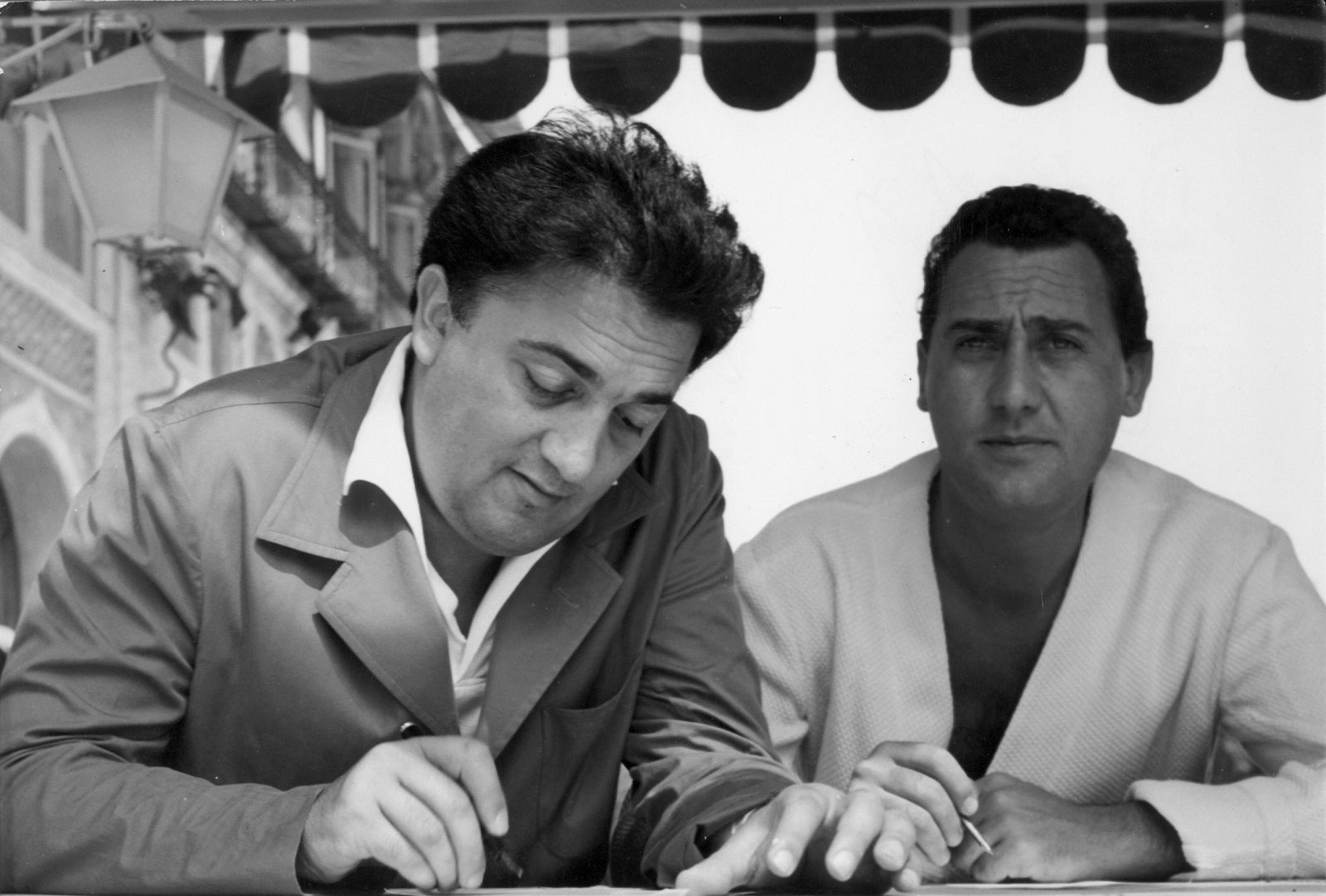 Alberto Sordi, Federico Fellini at the Venice Film Festival 1953- In case of set scenes, it is forbidden to reproduce the photograph out of context of the promotion of the film. It must be credited to the Film Company and the photographer assigned by or authorized by on the set by the Film Company.