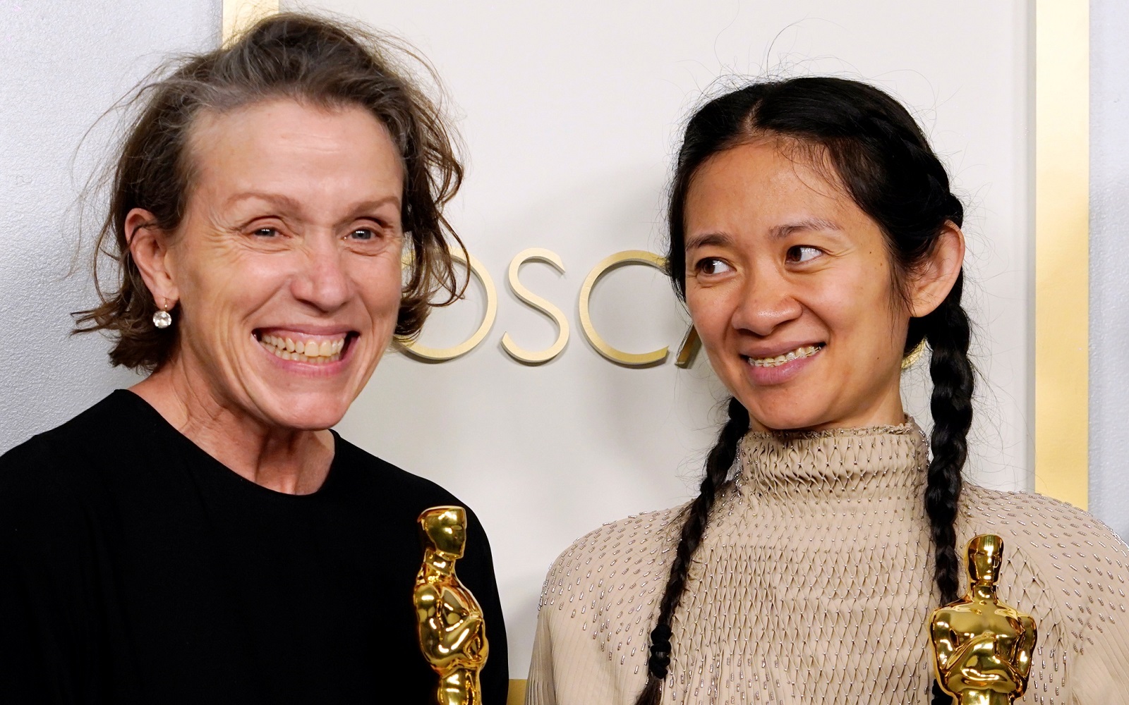 Producers Frances McDormand, left, and Chloe Zhao, winners of the award for best picture for "Nomadland," pose in the press room at the Oscars on Sunday, April 25, 2021, at Union Station in Los Angeles. (AP Photo/Chris Pizzello, Pool)