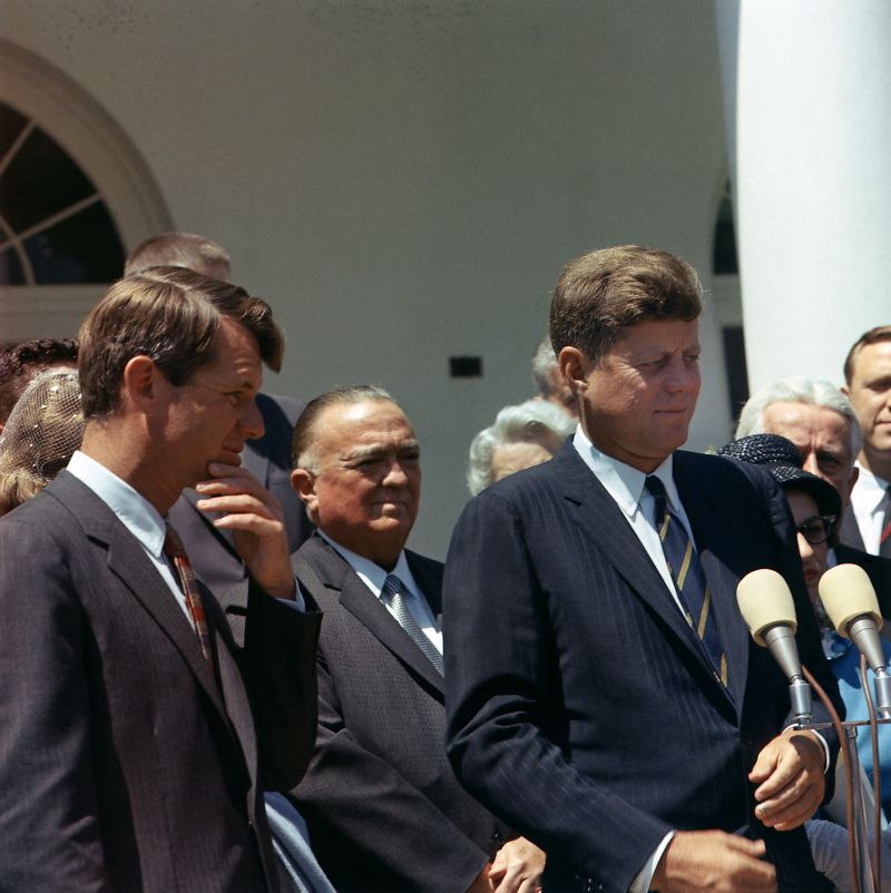 CWCD5B J. Edgar Hoover joins President John Kennedy for White House ceremony. L to R: Attorney General Robert Kennedy, J. Edgar