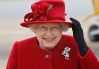 Britain's Queen Elizabeth II arrives at a windy RAF Valley in Anglesey, to visit her grandson Prince William at the base.
